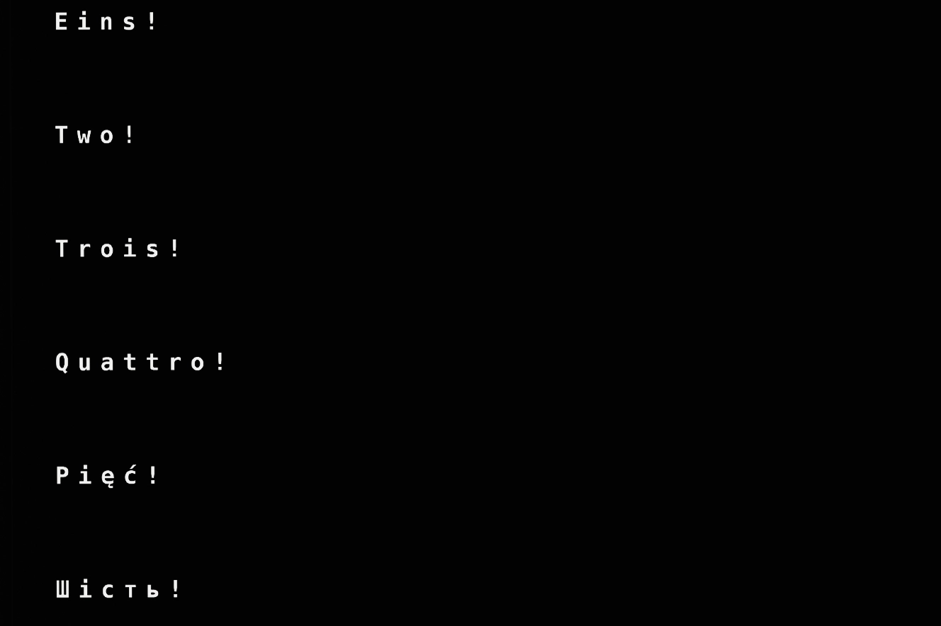 A magazine cover. Black background with white typography.